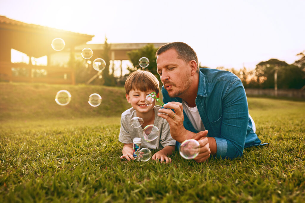 Cropped shot of a young family spending time together outdoors.